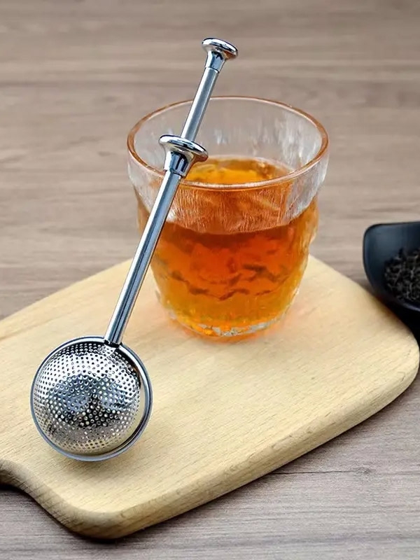 Telescopic infuser for tea and herbal teas, in stainless steel and with automatic opening